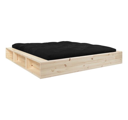 Dvojlôžková posteľ z masívneho dreva s úložným priestorom a čiernym futonom Double Latex Karup Design, 180 x 200 cm